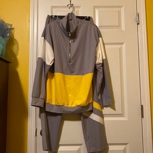 Gray leisure suit with yellow & white detail